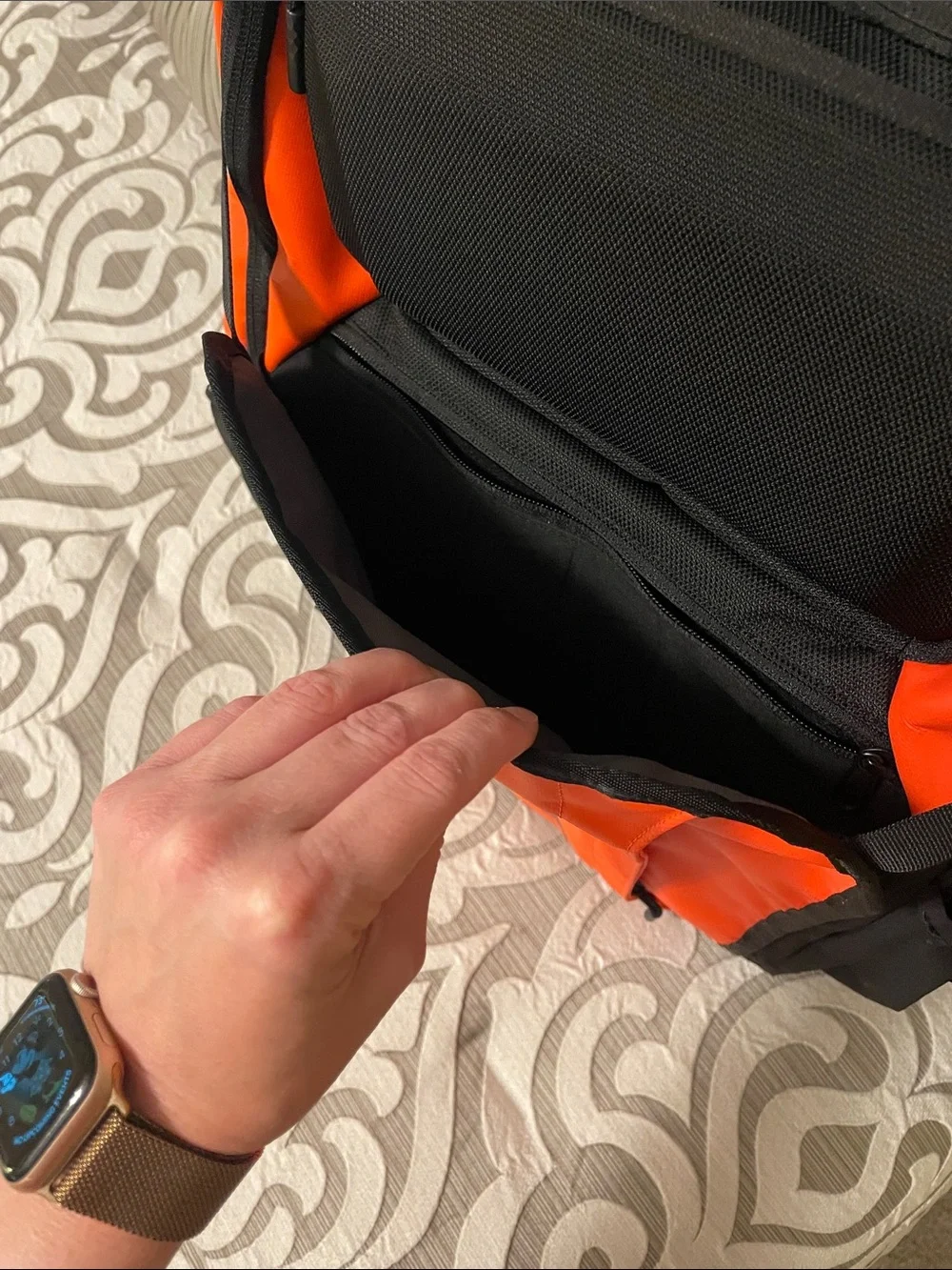 The North Face Orange and Black Backpack